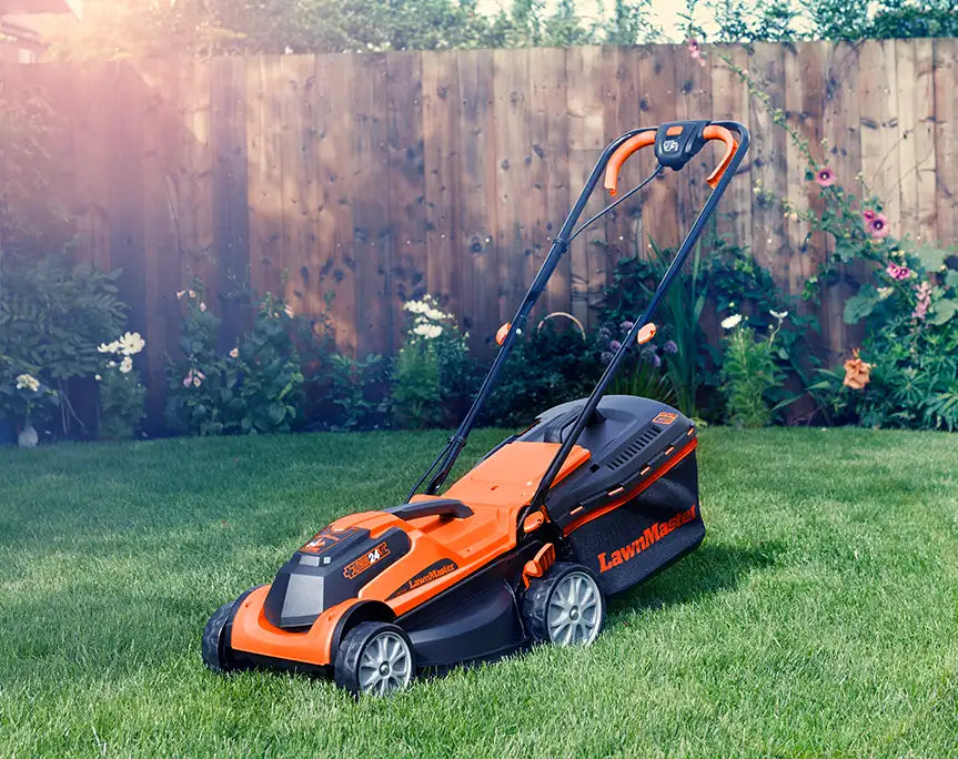 LawnMaster MX 24V 34cm Cordless Lawn Mower on UK lawn comes with 2 year Guarantee